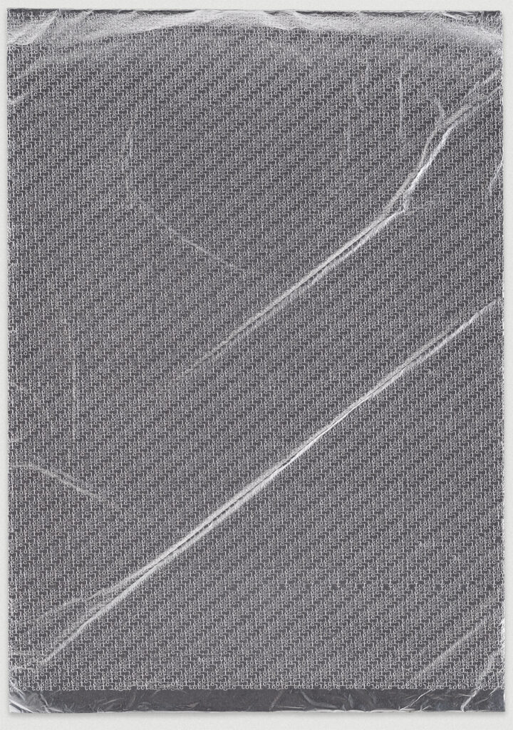 Aluminium-Sheet, embossed and titled: "Total Logic"